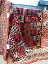 (4) Iranian carpet with floral pattern