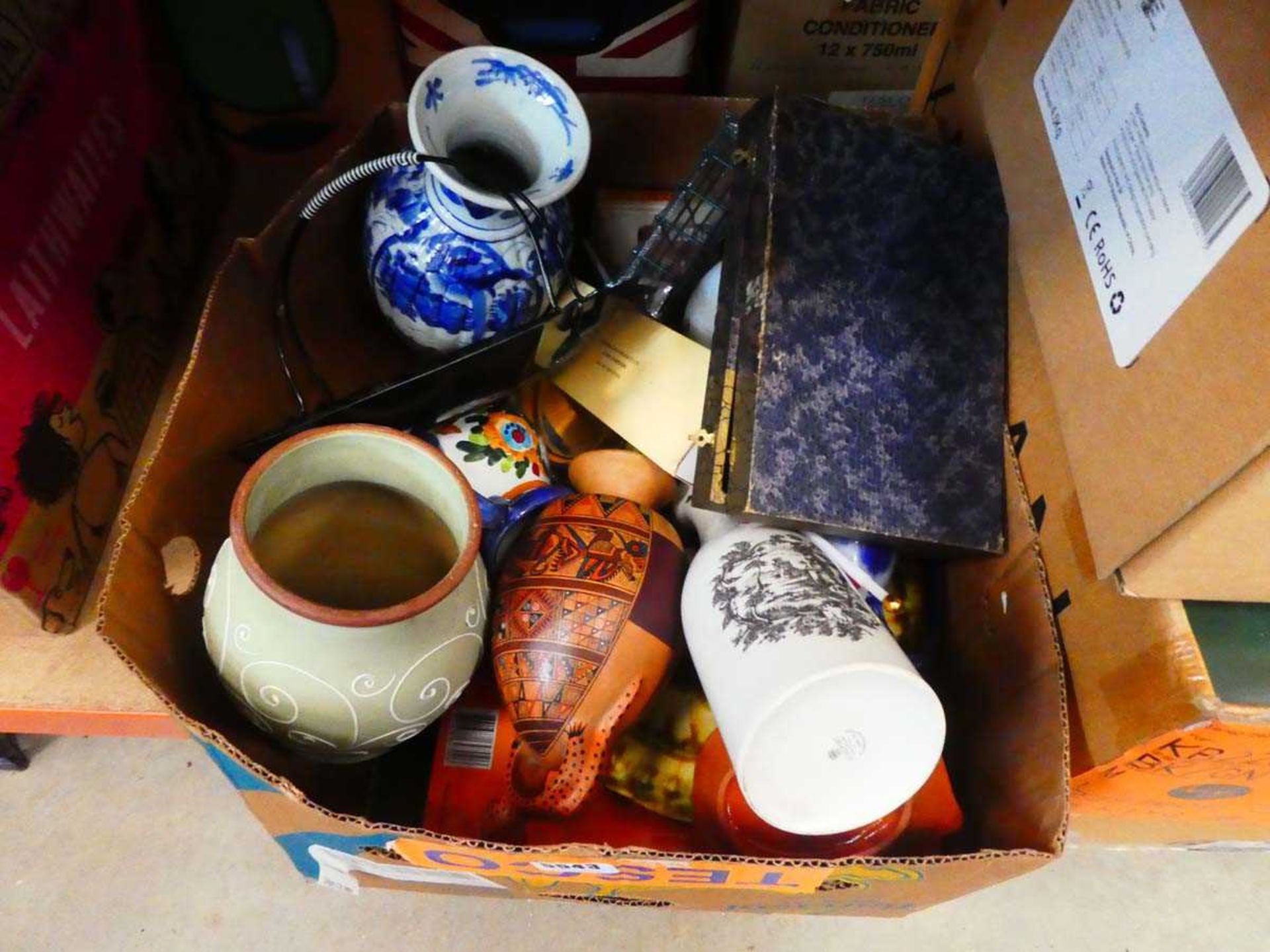 Box of pottery vases, blue and white china and household goods inc. cutlery and board games