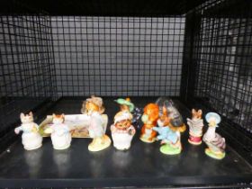 Cage of Beatrix Potter Beswick figures, glass ornaments and a Lilliput Lane cottage