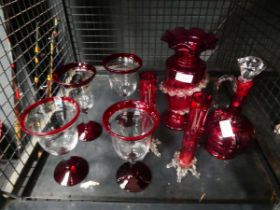 Quantity of cranberry glass inc. vases, oversize goblets and decanter