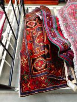 (f) Persian woollen rug with geometric pattern