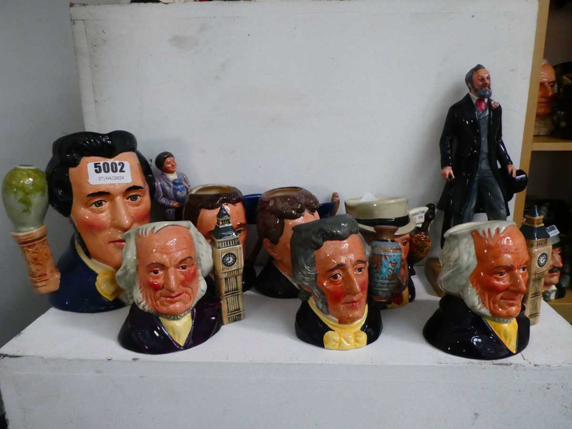 Eight various sized character jugs depicting members of the Doulton family