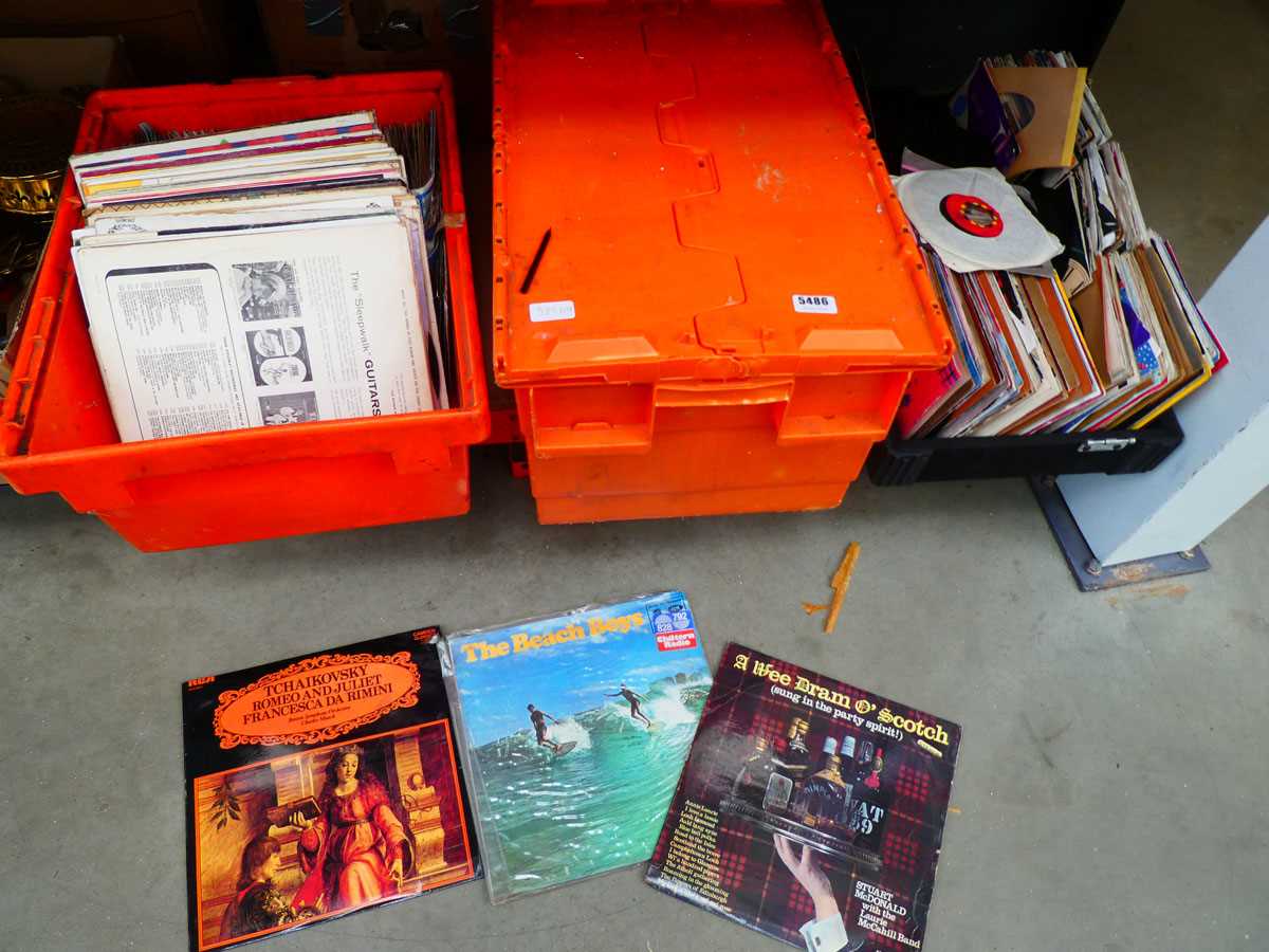 3 boxes containing vinyl records