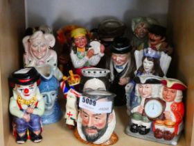 Approx. 14 small character jugs depicting clowns, jokers, tambourine player, Queen Victoria etc.