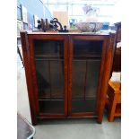 Glazed oak double door bookcase