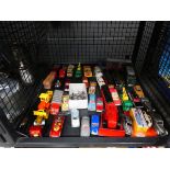 Cage containing play worn diecast vehicles