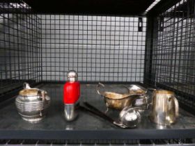 Cage of silver plate and silver inc. hip flask, 2 milk jugs, sugar bowl, toddy labels and