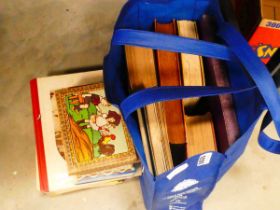 Bag and stack of children's books