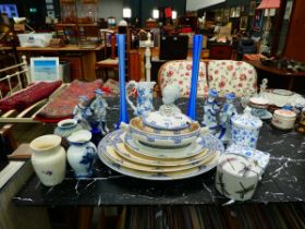 Quantity of blue and white meat platters plus tureens, European figures, floral and other vases