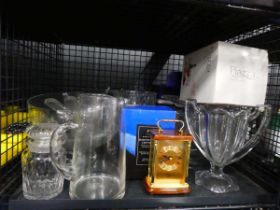 Cage containing glass vases, dishes, jugs and quartz clock