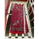 (c) Hamadan red floral carpet