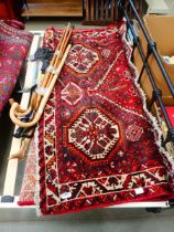 Woollen carpet with floral patterns and medallions