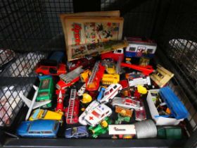 Cage containing play worn die-cast vehicle plus Dandy comics