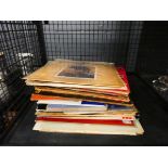 Cage containing a quantity of Elvis Presley records