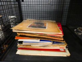Cage containing a quantity of Elvis Presley records