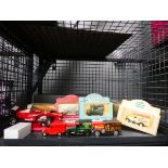 Cage of die cast vans and Formula One car