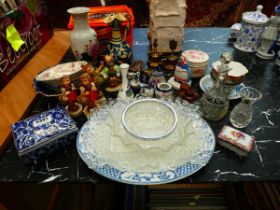 Table top with miniature candlesticks, brass bells, meat mincer, modern Chinese vase, blue and white