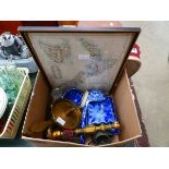 Box containing a map of New Zealand, military medals, brass candlestick, table lamp, blue and