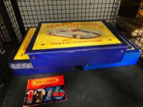 Cage containing Matchbox vehicles