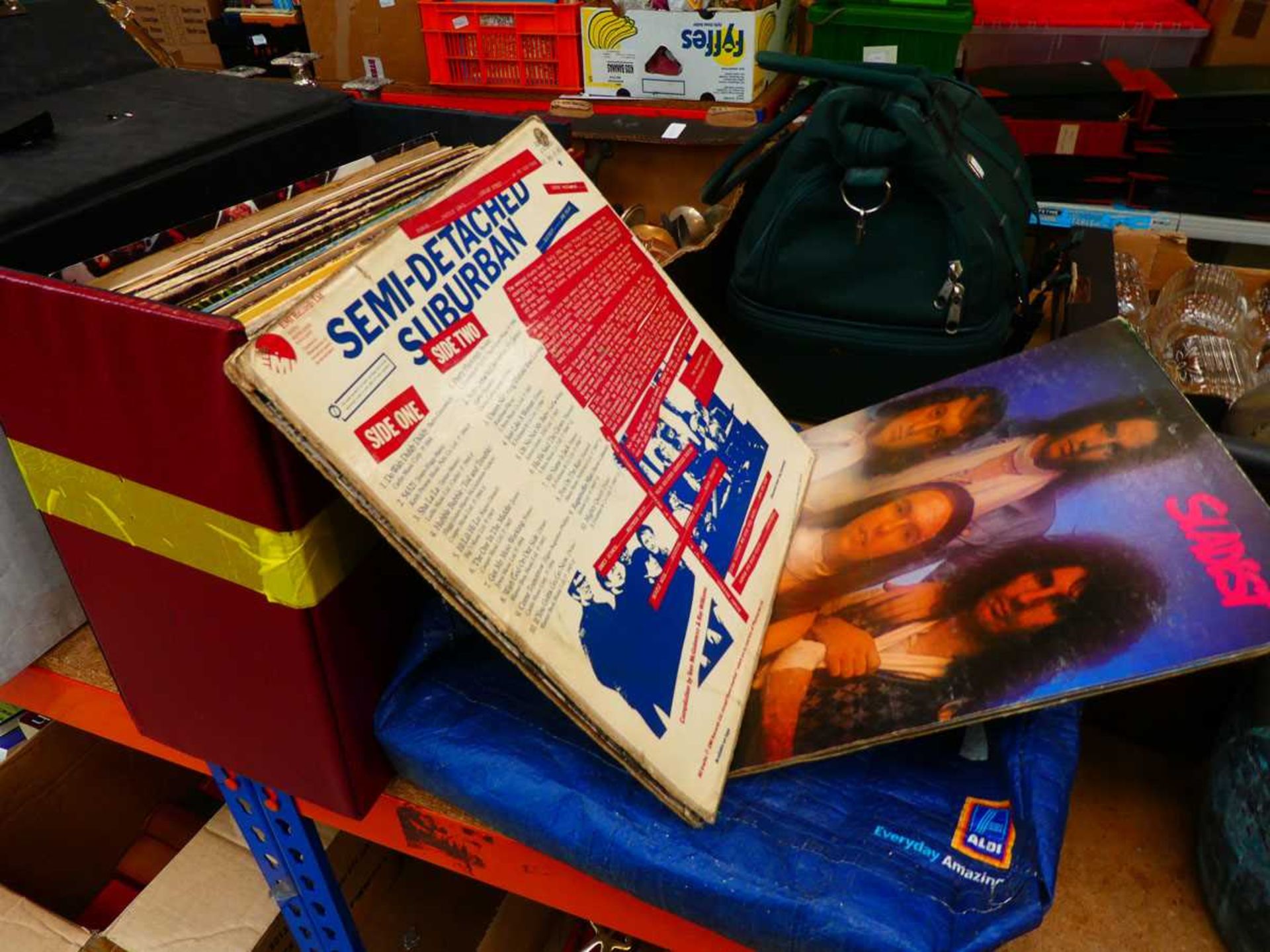 Box and bag containing vinyl records