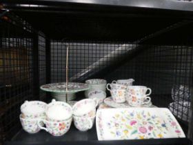Cage containing a large quantity of Minton Haddon Hall patterned crockery