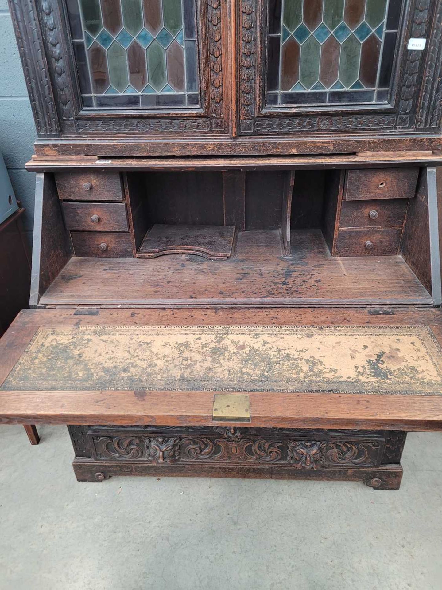 Heavily carved oak bureau bookcase with glazed and leaded door panels Approx. dimensions: depth 20 - Image 2 of 9