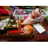 Box containing small chestnut roaster, bisque dolls and a vanity set