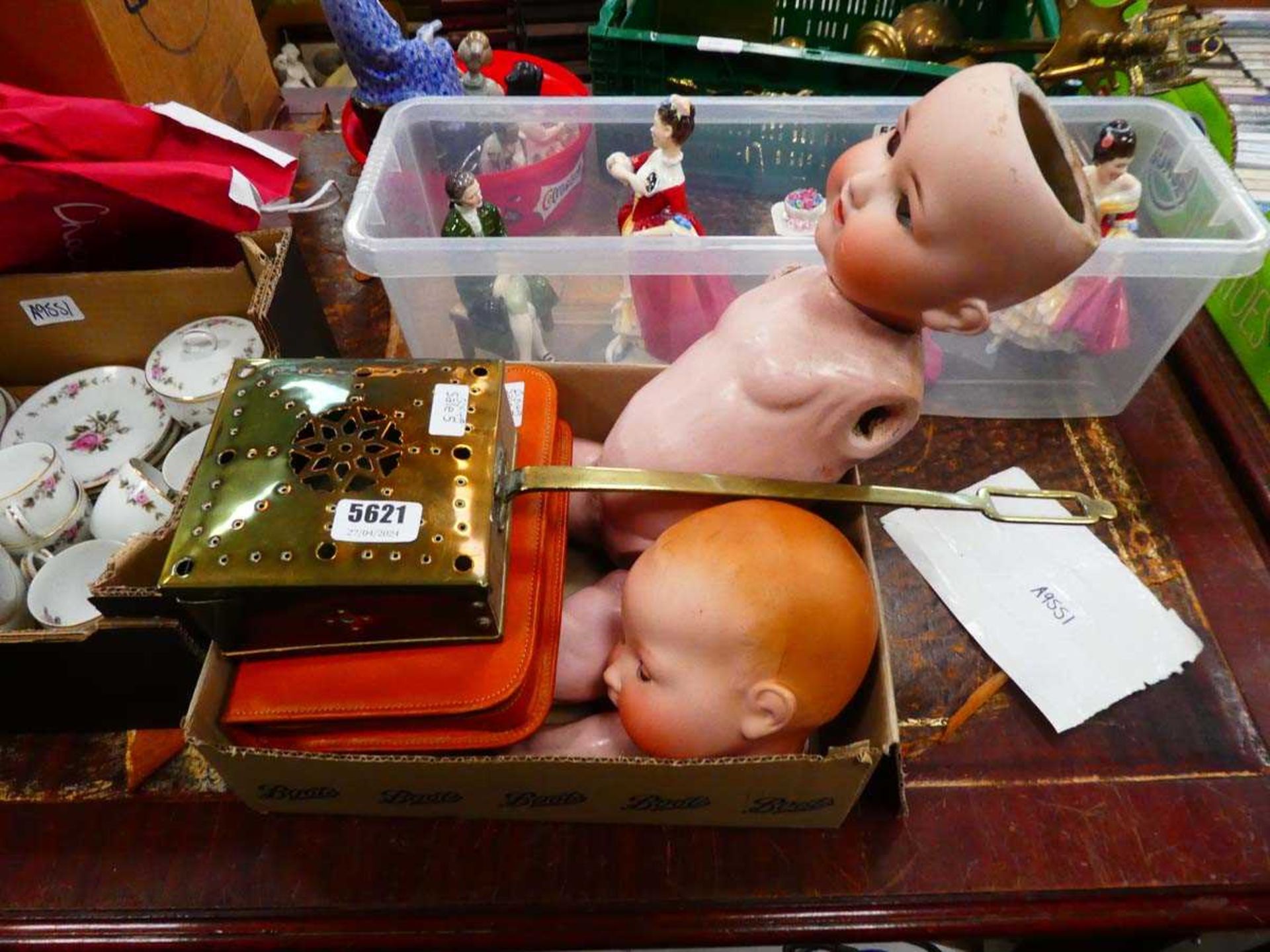 Box containing small chestnut roaster, bisque dolls and a vanity set