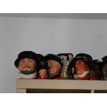 Five large Character Jugs and 1 small Character Jug depicting pipers, guardsmen, and Beefeaters