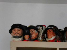 Five large Character Jugs and 1 small Character Jug depicting pipers, guardsmen, and Beefeaters