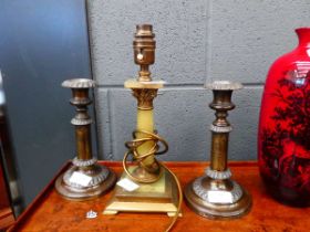 Pair of silver plated candlesticks plus an onyx and brass lamp