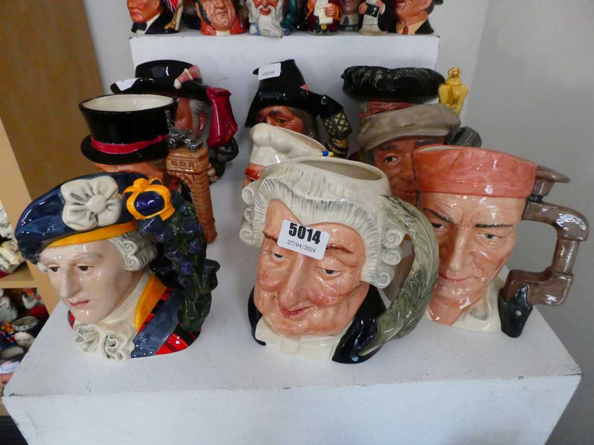 9 large Character Jugs to include Bonnie Prince Charlie, a carpenter, George Stephenson etc.