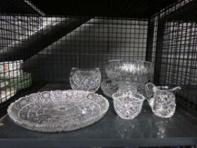 Cage containing glass fruit bowls plus a jug