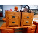 Pair of oak two drawer bedside cabinets