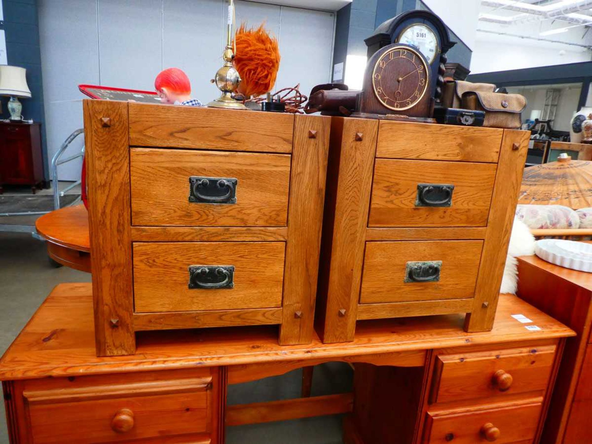 Pair of oak two drawer bedside cabinets