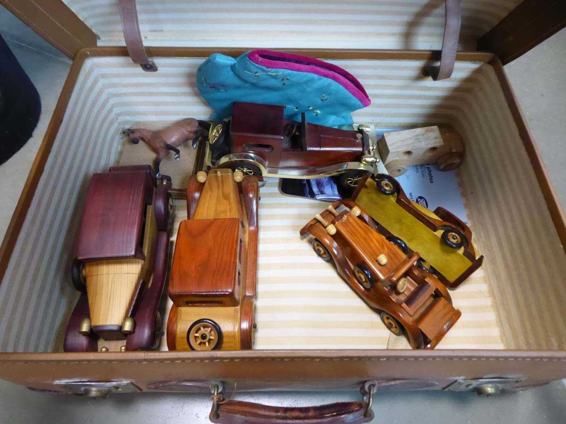Suitcase containing die cast vehicles