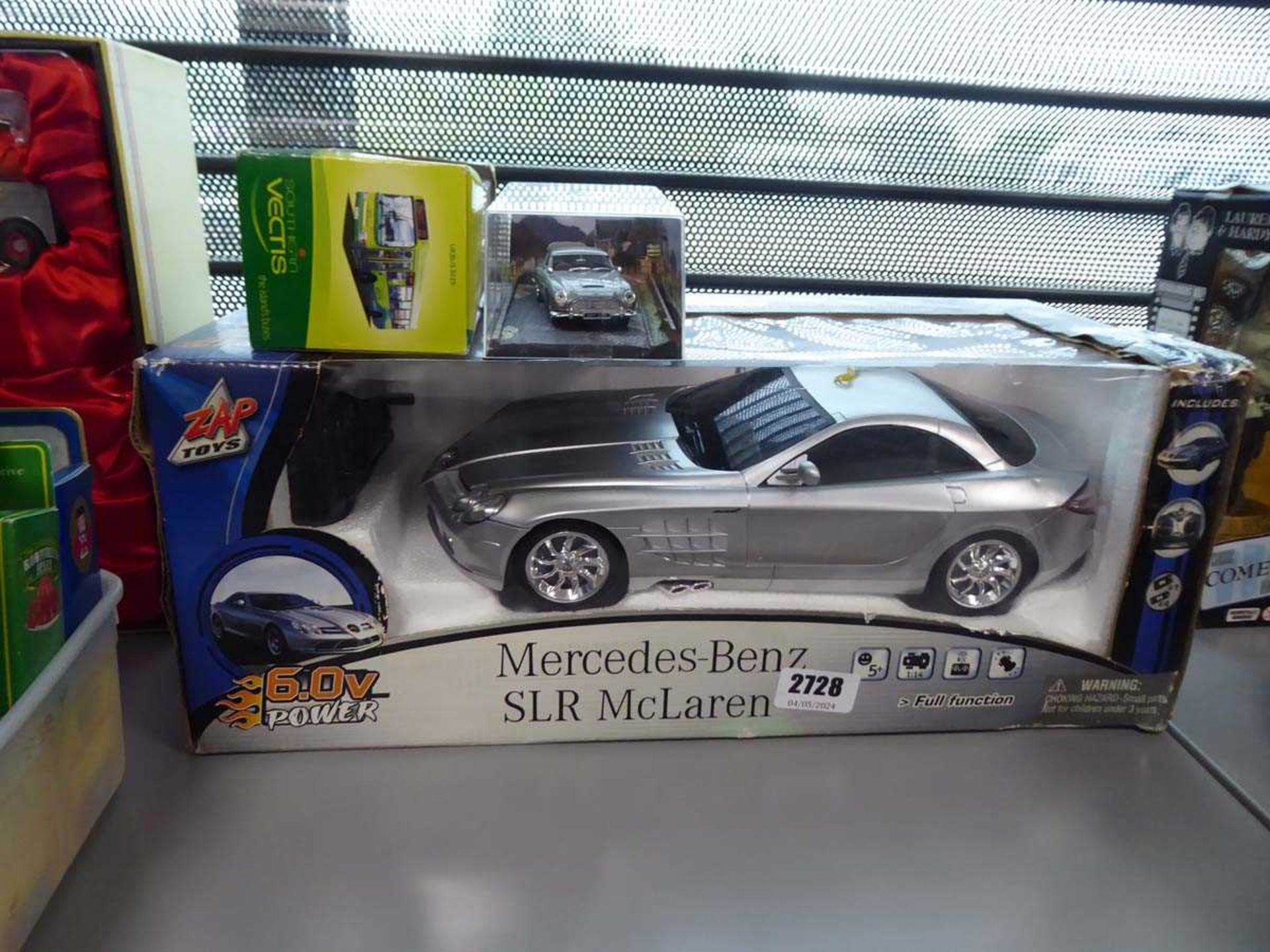 Mercedes-Benz SLR McLaren diecast model, Aston Martin Thunderball model and Vectis Bus model