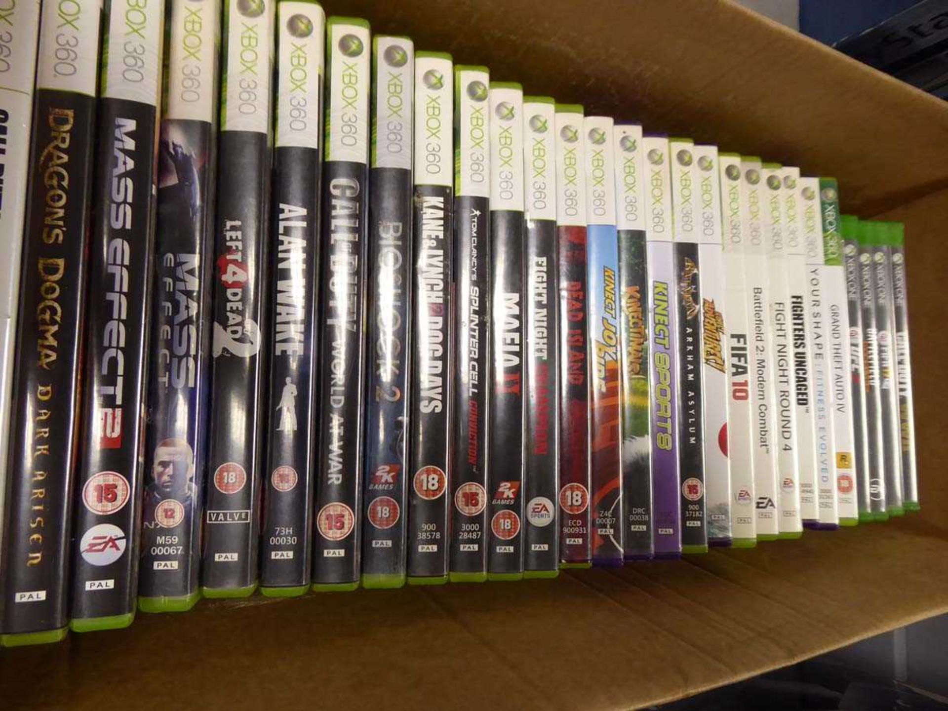Box containing Xbox One and 360 games
