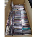 Box of CDs and headphones