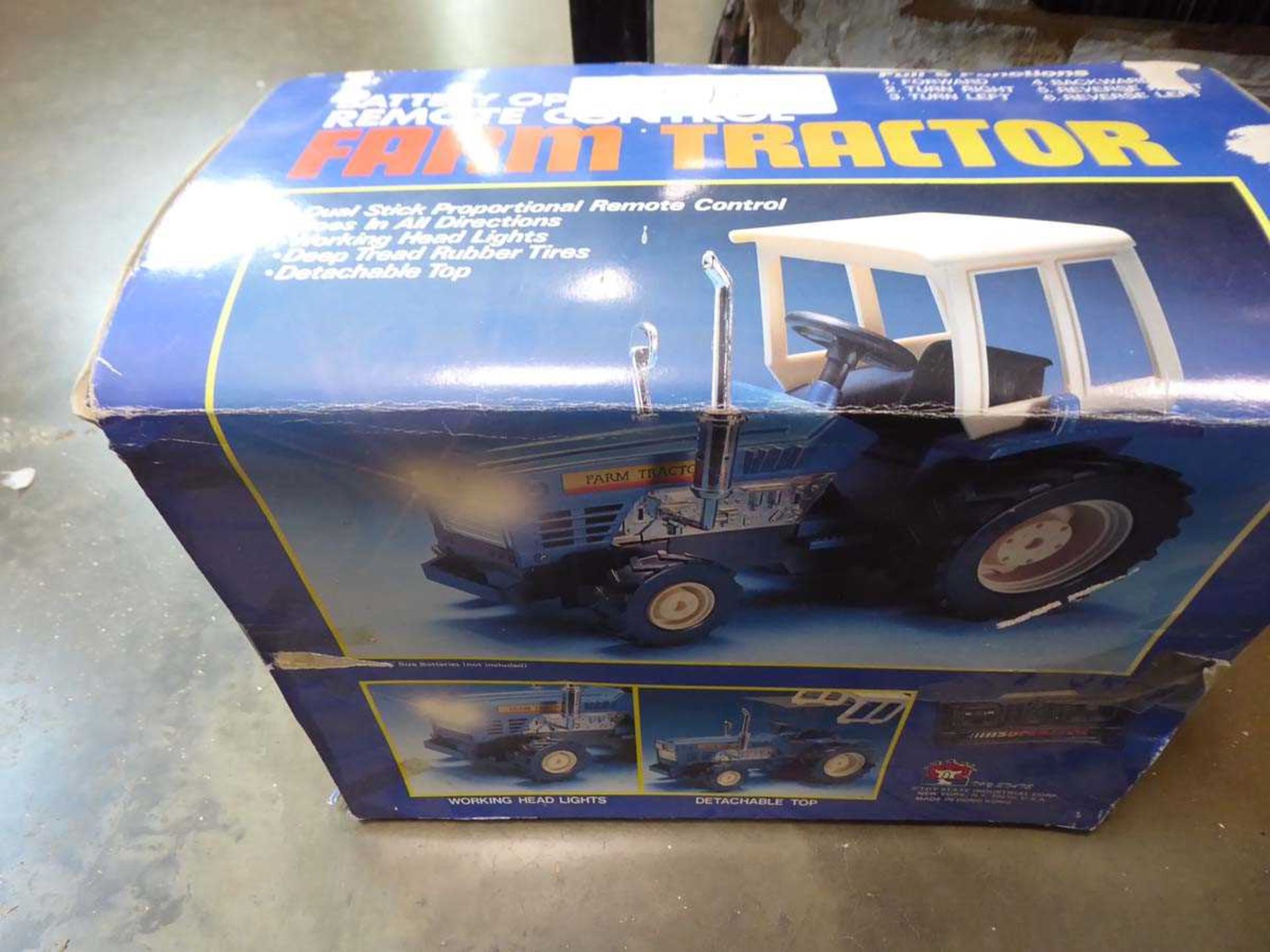 Box containing die cast vehicles