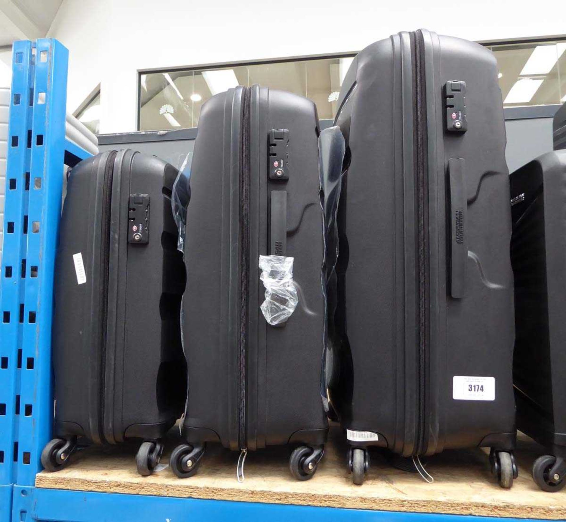 +VAT Triple hard shelled American Tourister suitcase set