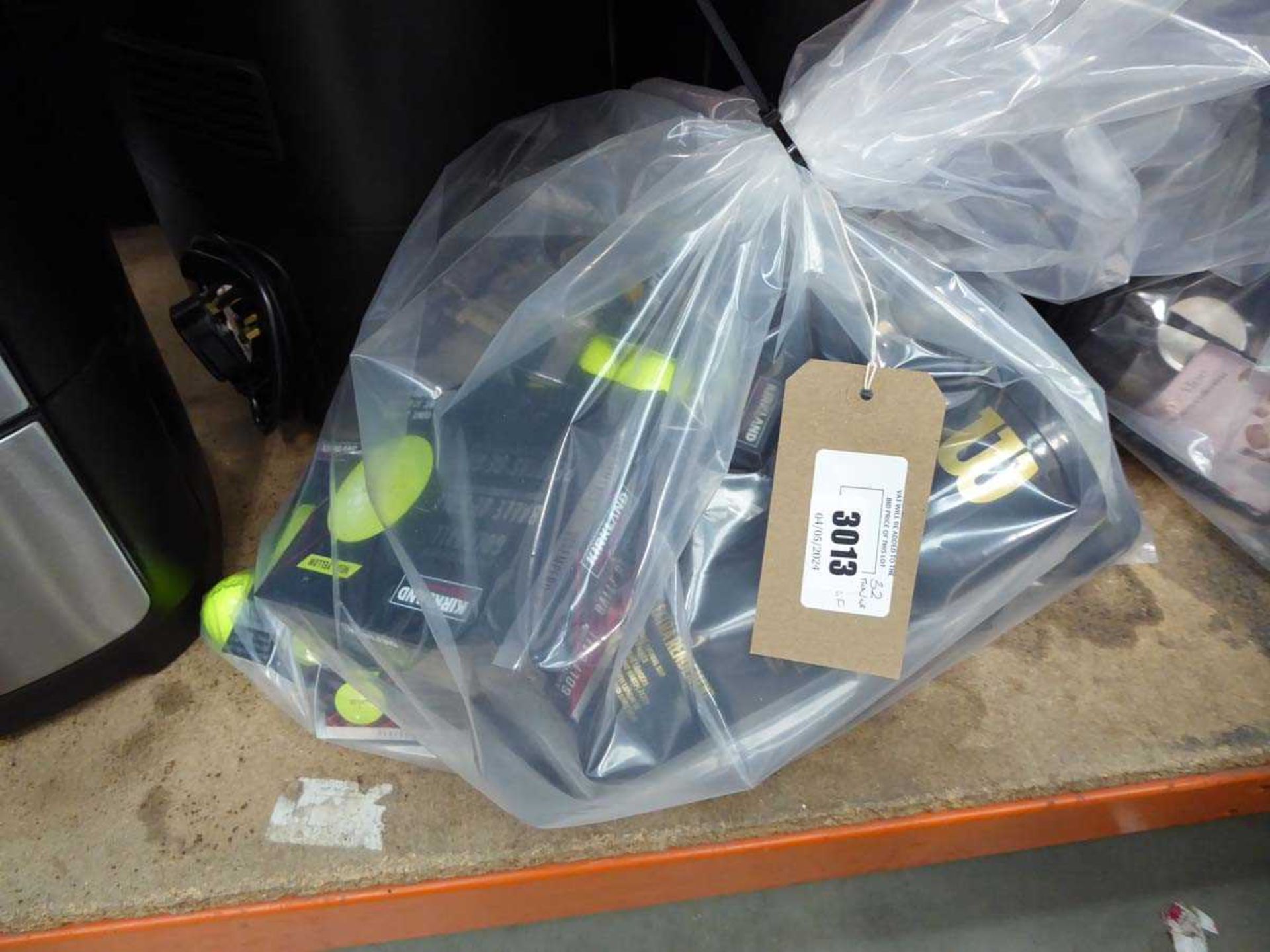 +VAT Bag containing golf balls, Wilson tennis balls, etc