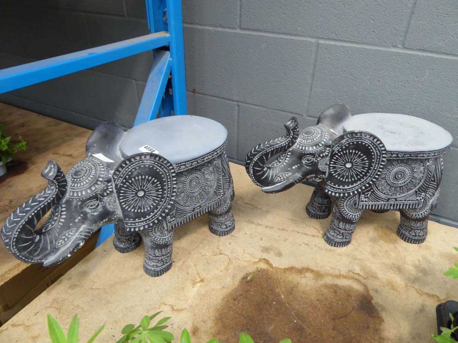 2 elephant plant stands