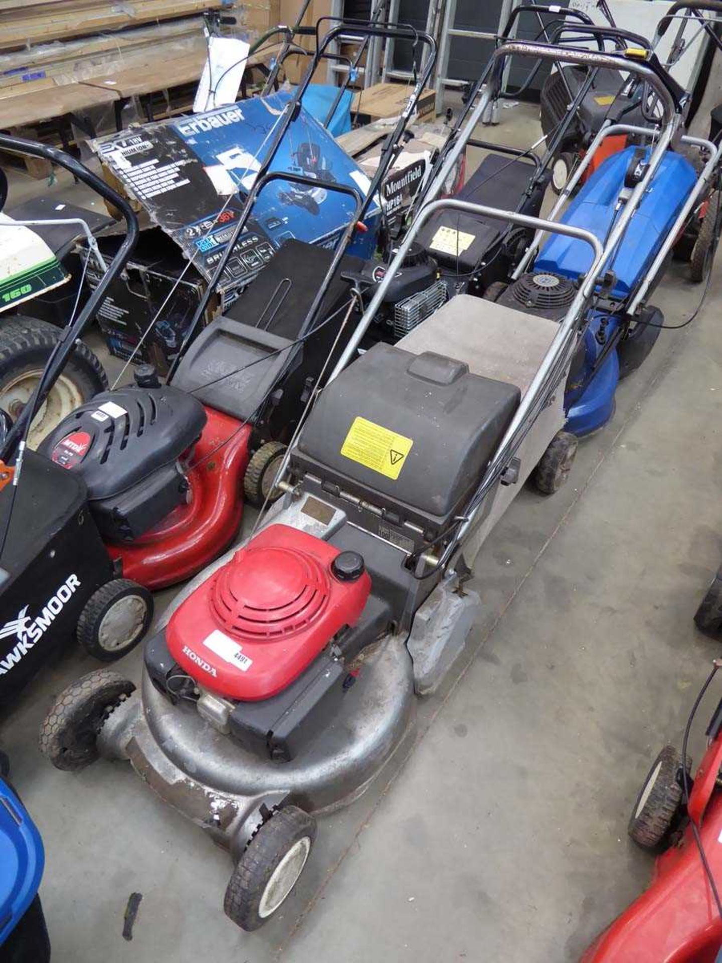 Honda petrol powered rotary mower with grass box