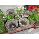 Pallet of concrete garden pots