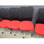 2 red cloth mesh back swivel chairs