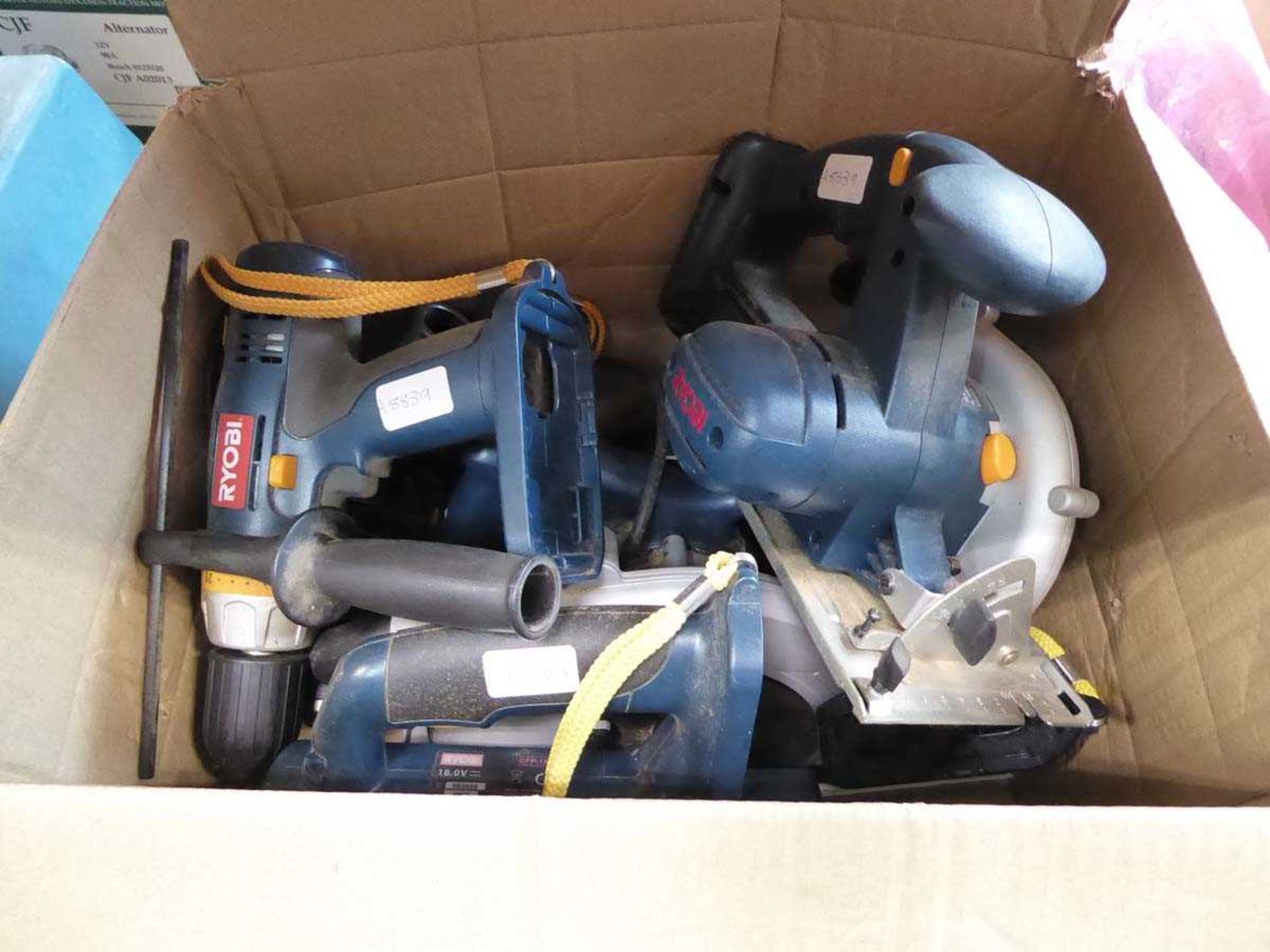 Box of Ryobi power tools