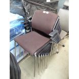7 brown cloth stacking chairs