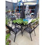 Square glass topped garden table with 4 matching chairs and parasol