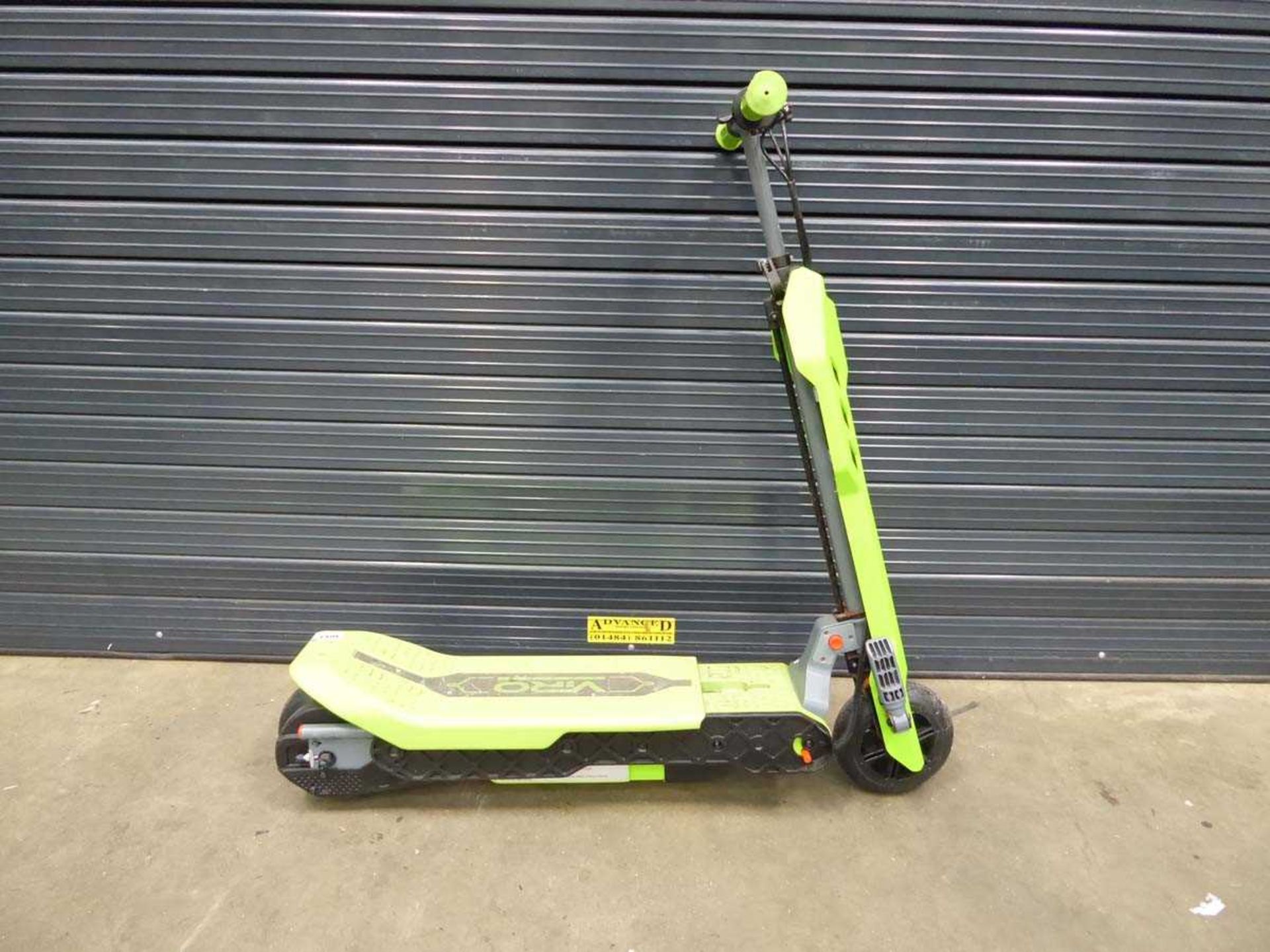 Green electric scooter